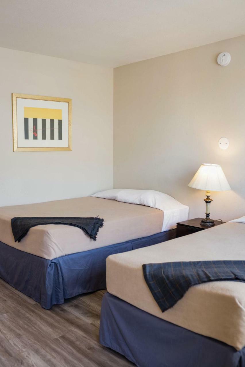 Merit Inn And Suites Бомонт Экстерьер фото